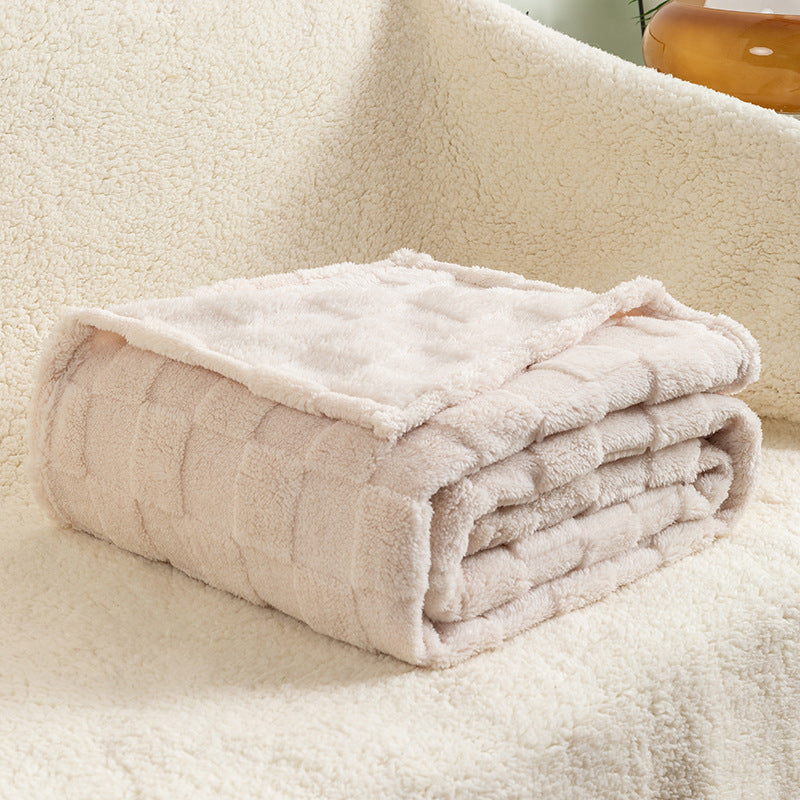 Plaid cocooning sur fauteuil lecture coin détente slow living